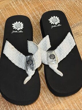 Yellow box flip flops